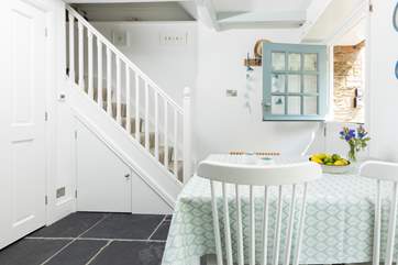 The stairs lead to the first floor bedrooms and family bathroom.