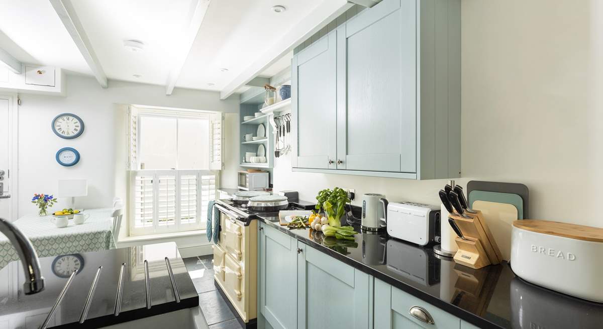 The kitchen has a fabulous electric Aga.