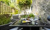 Such a blissful spot to enjoy al fresco dining.  - Thumbnail Image