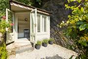 Escape to the sun-room at the top of the terraced gardens.