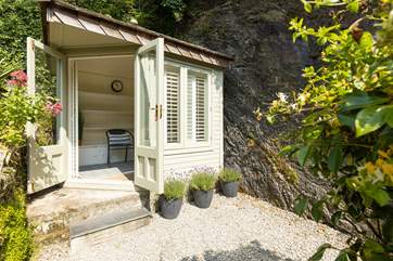 Escape to the sun-room at the top of the terraced gardens.