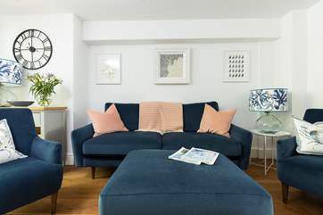 Relax in front of the Smart TV on the comfy sofa.