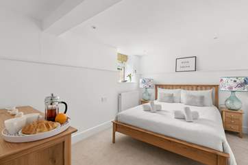 Lovely bedroom 2 has a king-size bed.