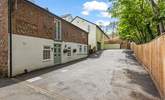 Welcome to The Flint Coach House on the left. The secluded outside seating area is at the top of the picture, the adjoining building is unused. - Thumbnail Image