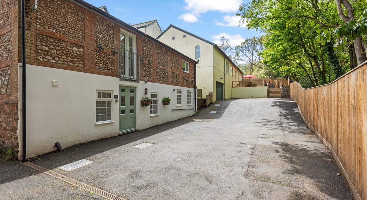 Welcome to The Flint Coach House on the left. The secluded outside seating area is at the top of the picture, the adjoining building is unused.