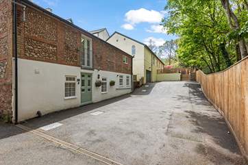 Welcome to The Flint Coach House on the left. The secluded outside seating area is at the top of the picture, the adjoining building is unused.