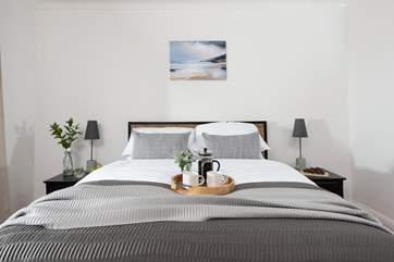 Lovely bedroom one has a super comfy king-size bed.