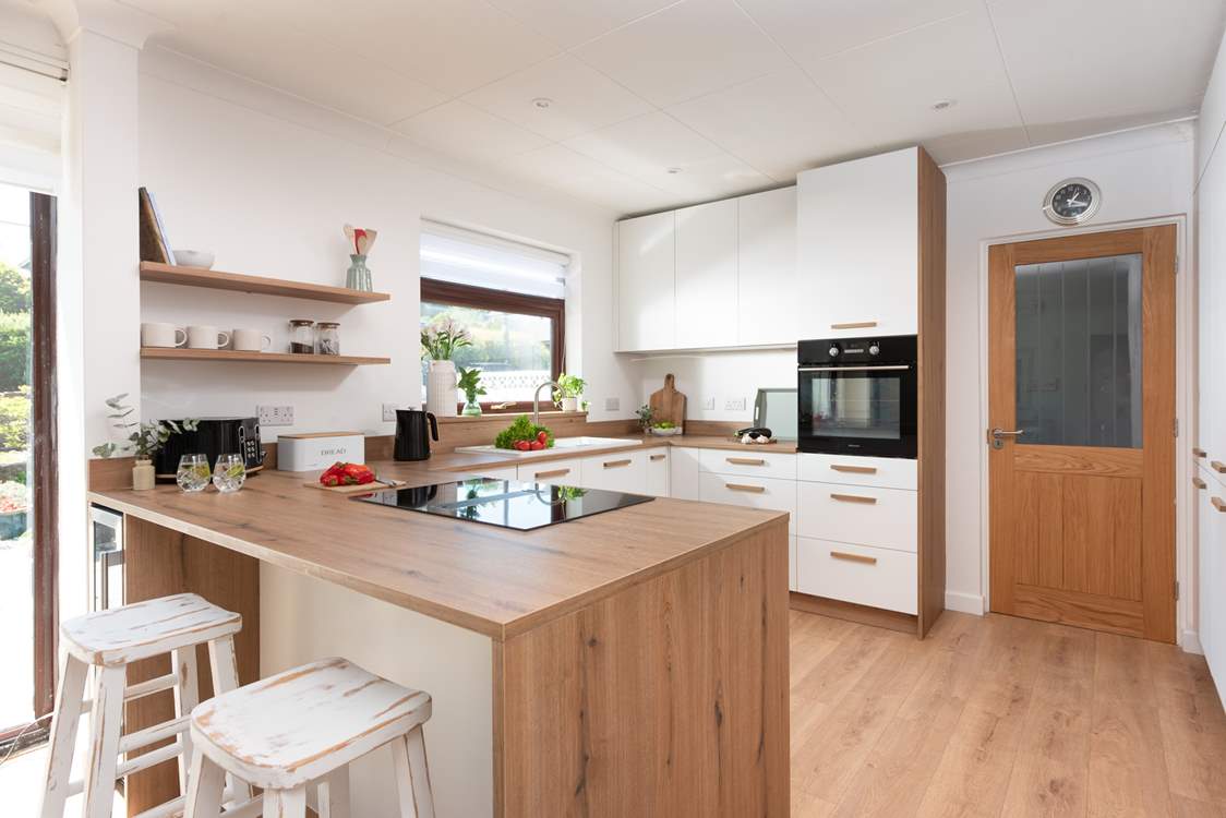 Step in and discover the welcoming kitchen and dining space.