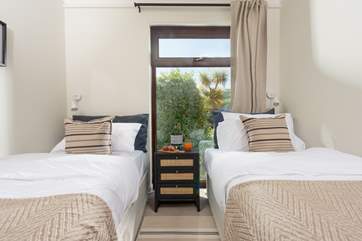 Bedroom three has twin beds.