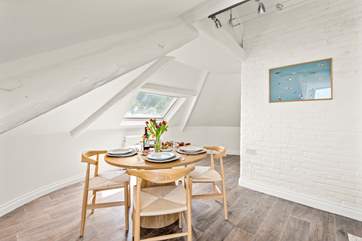 The dining-area is super cute, offering plenty of space for two to lay out that romantic evening meal.