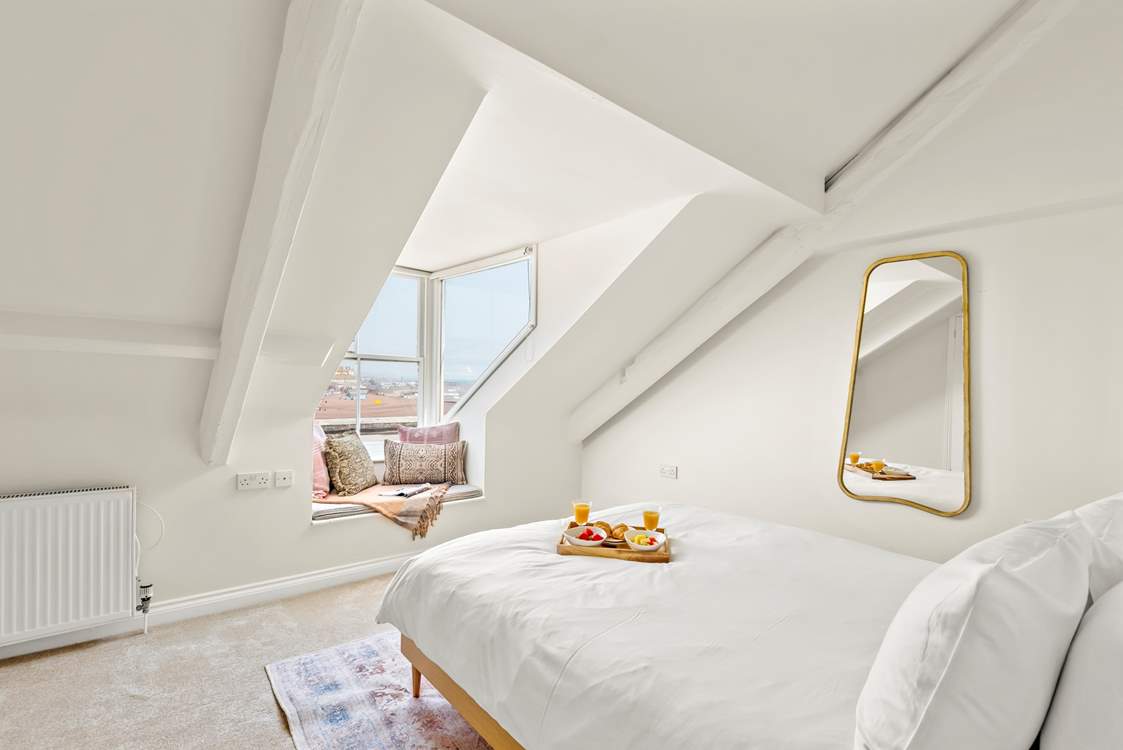 The bedroom is also treated to magnificent views.