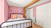 Bedroom two is cute and compact.