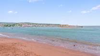 Endless days of sandcastle building await. However, if you fancy a trip over to Teignmouth, you can catch the foot ferry directly from the beach.