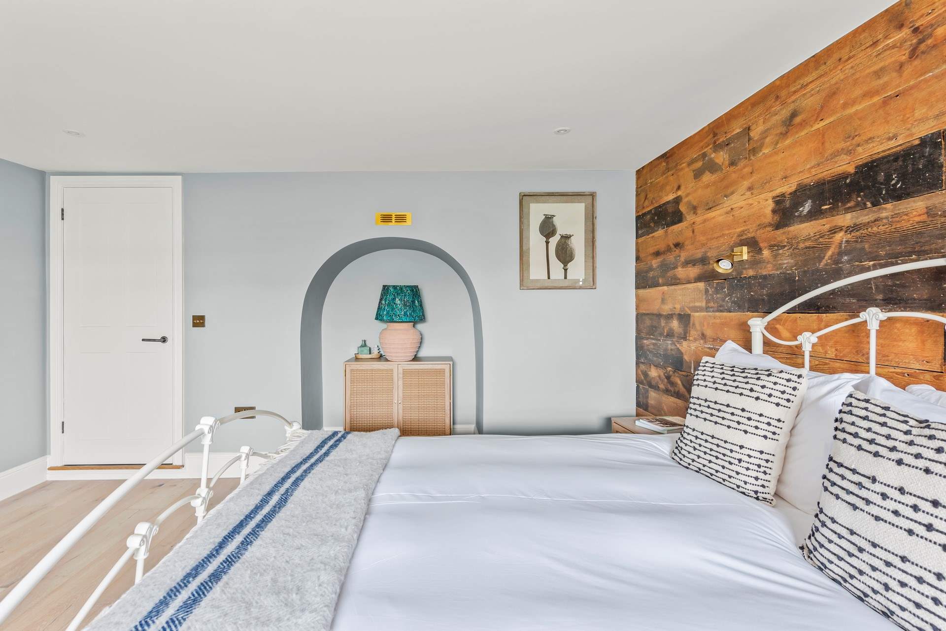 Bedroom one opens up into the hallway in front of the shared bathroom, which is in 'Jack and Jill' format.