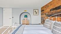 Bedroom one opens up into the hallway in front of the shared bathroom, which is in 'Jack and Jill' format.