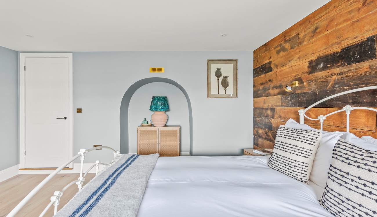 Bedroom one opens up into the hallway in front of the shared bathroom, which is in 'Jack and Jill' format.