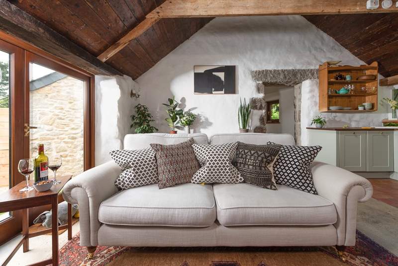 The cosy sofa, the perfect place to relax after a busy day.