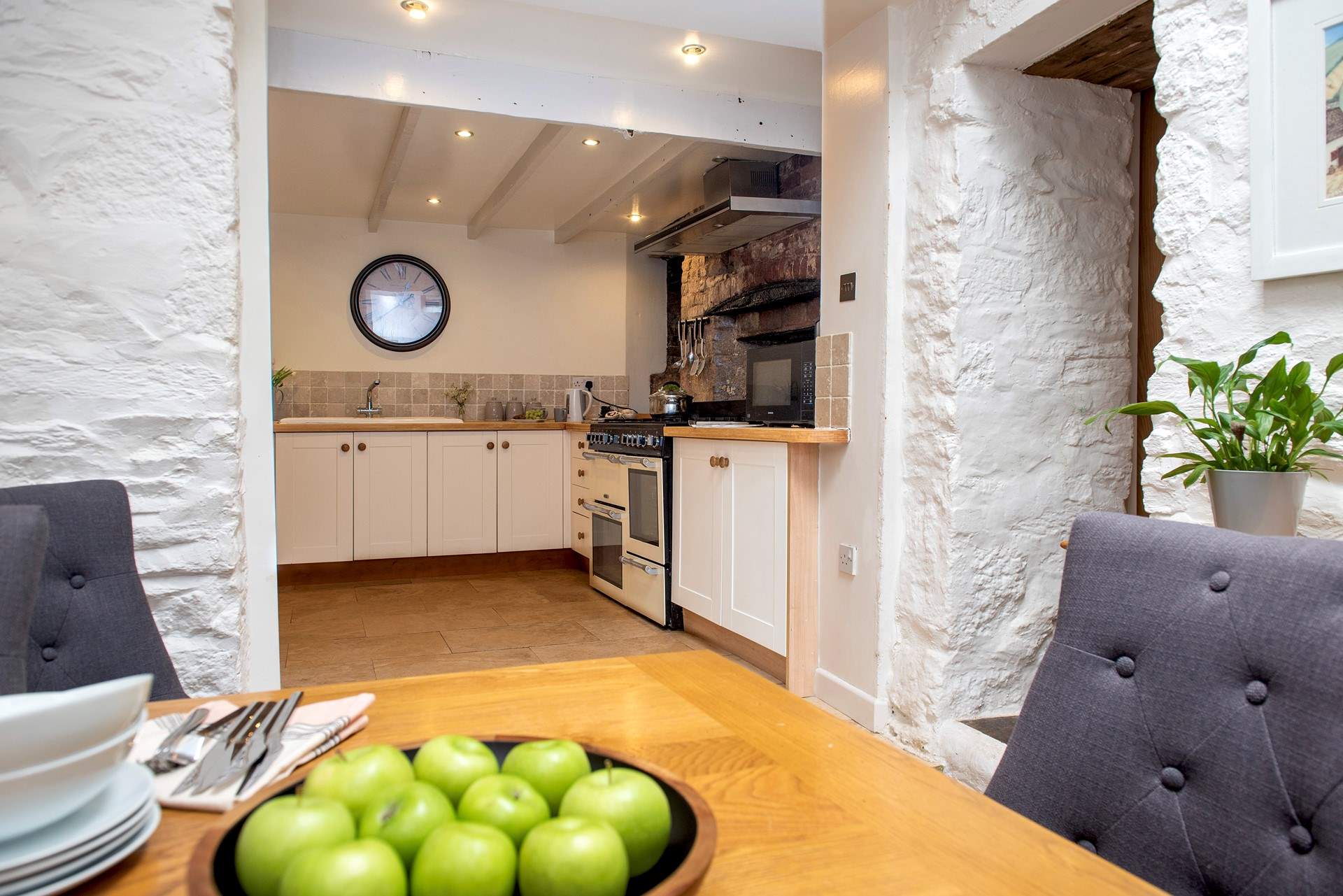 Steps from the dining-area lead up to the kitchen.