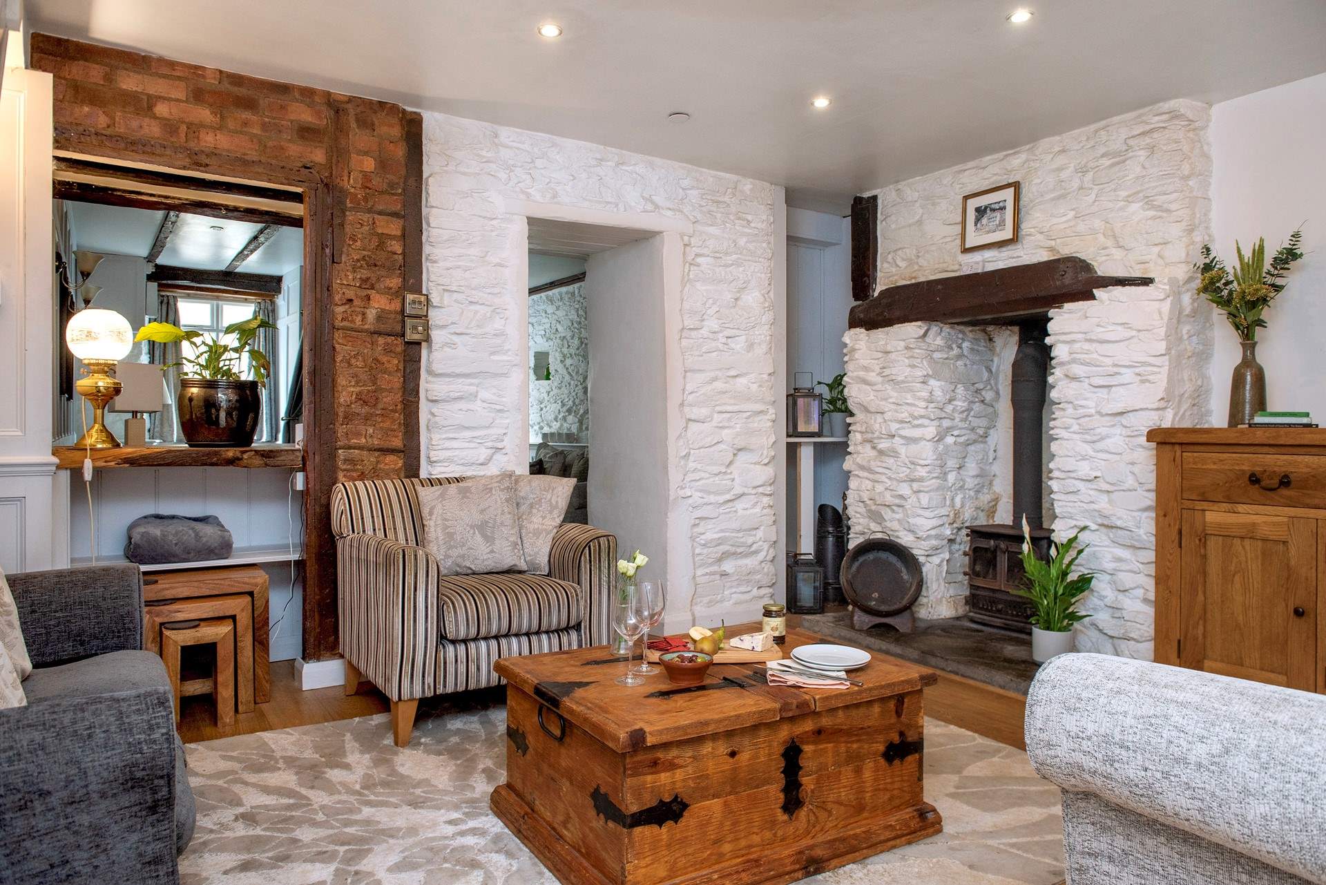 The second sitting-area has that all-important wood-burning stove, making it even cosier on chilly evenings.