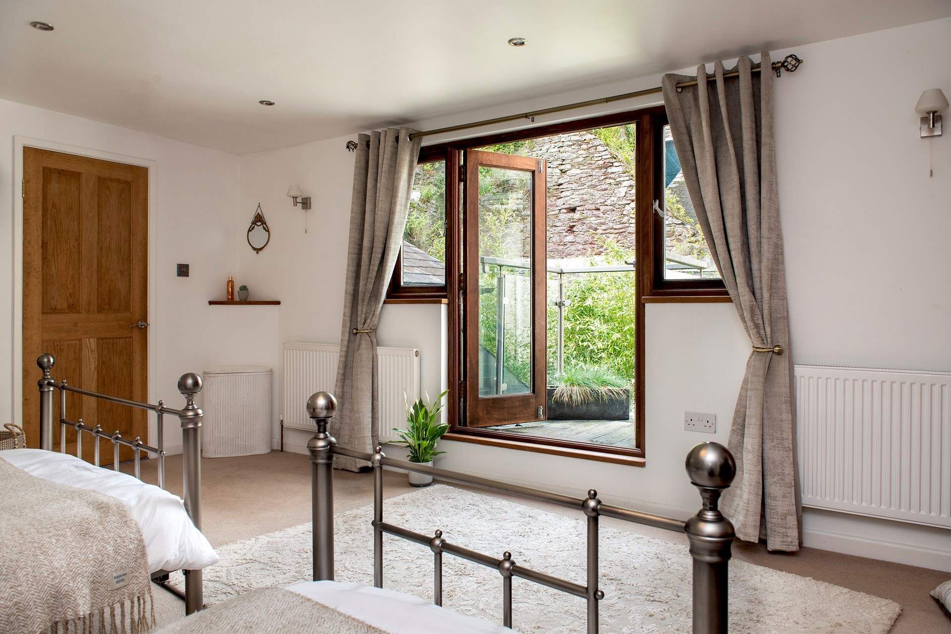 There's a little balcony leading off from the second bedroom.