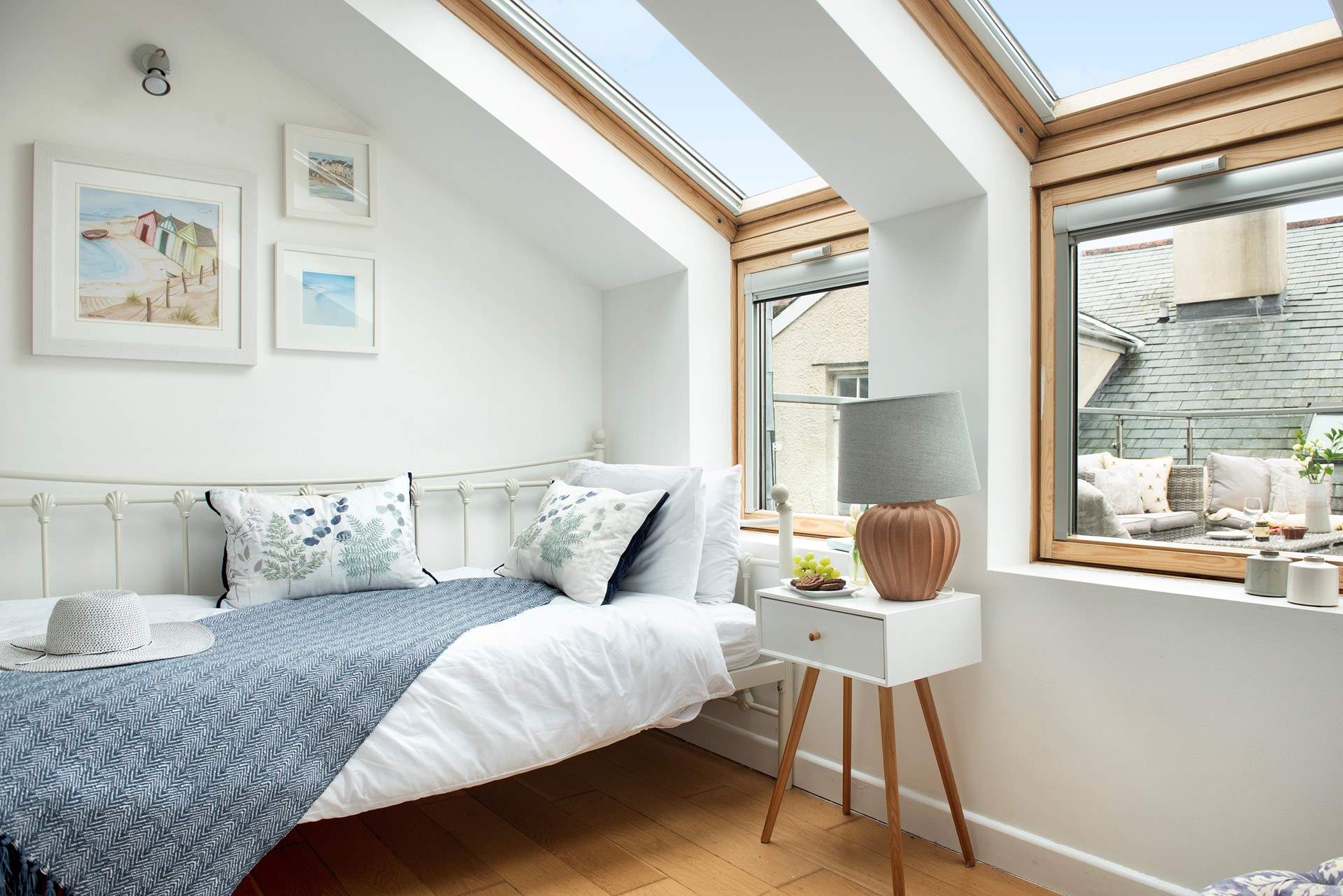 This pretty room looks out onto the roof terrace.