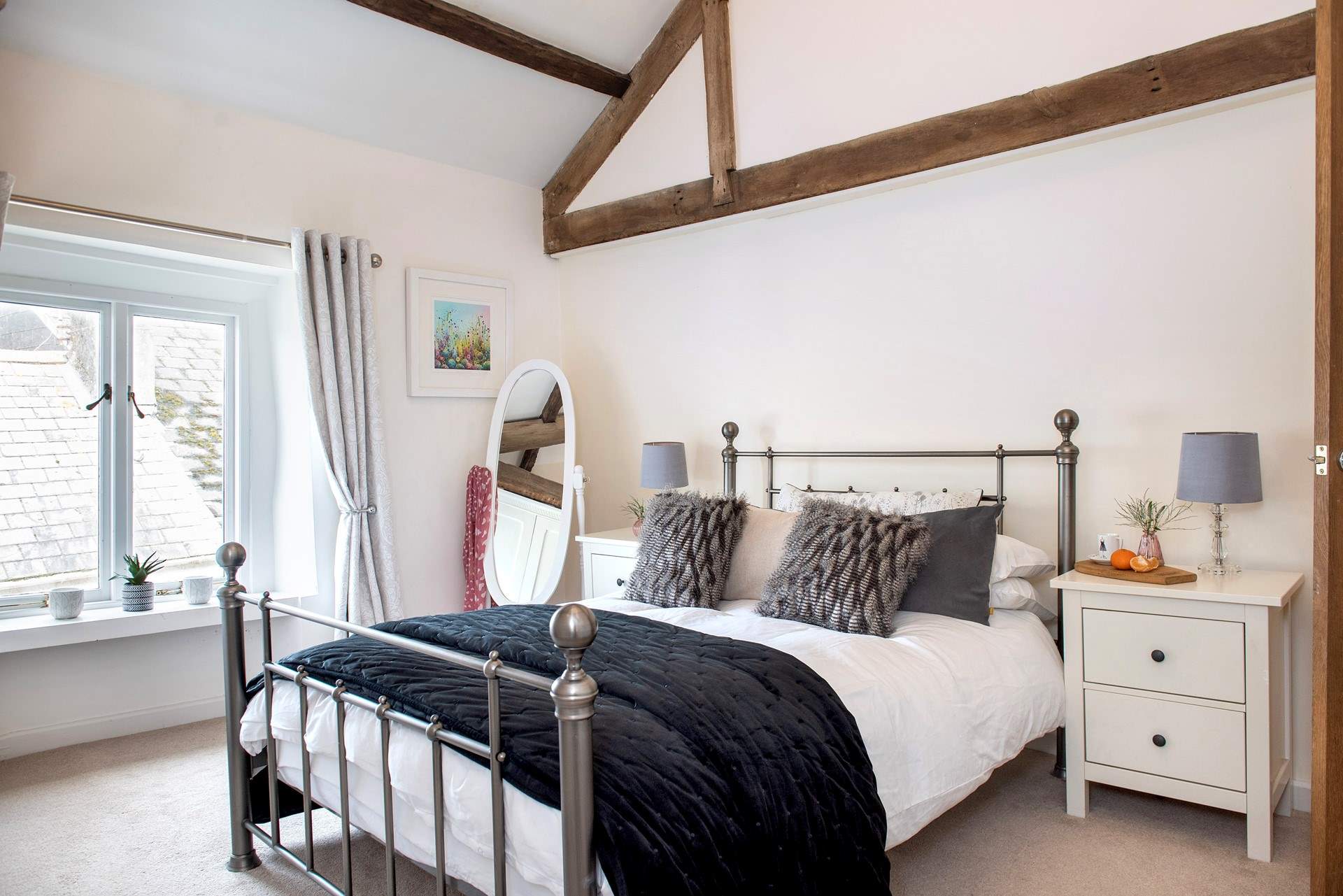 Exposed beams add to the character in bedroom 4.
