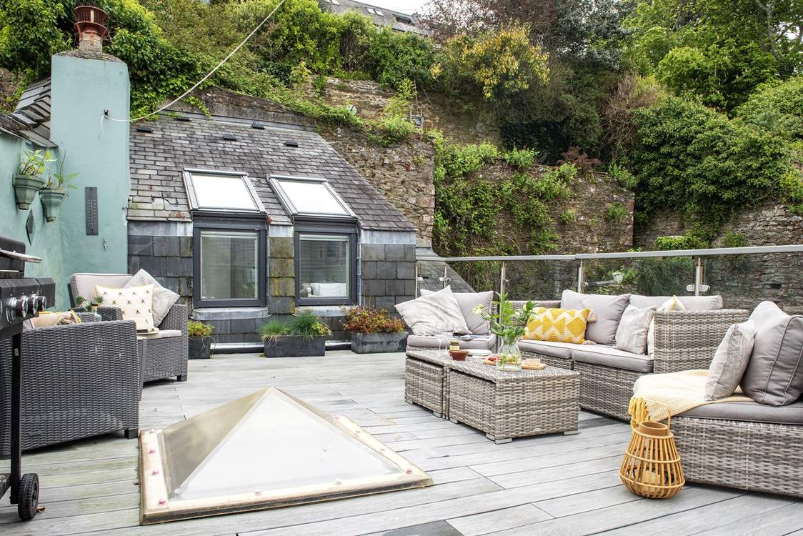 The sunny roof terrace is a great place for all to gather outdoors.