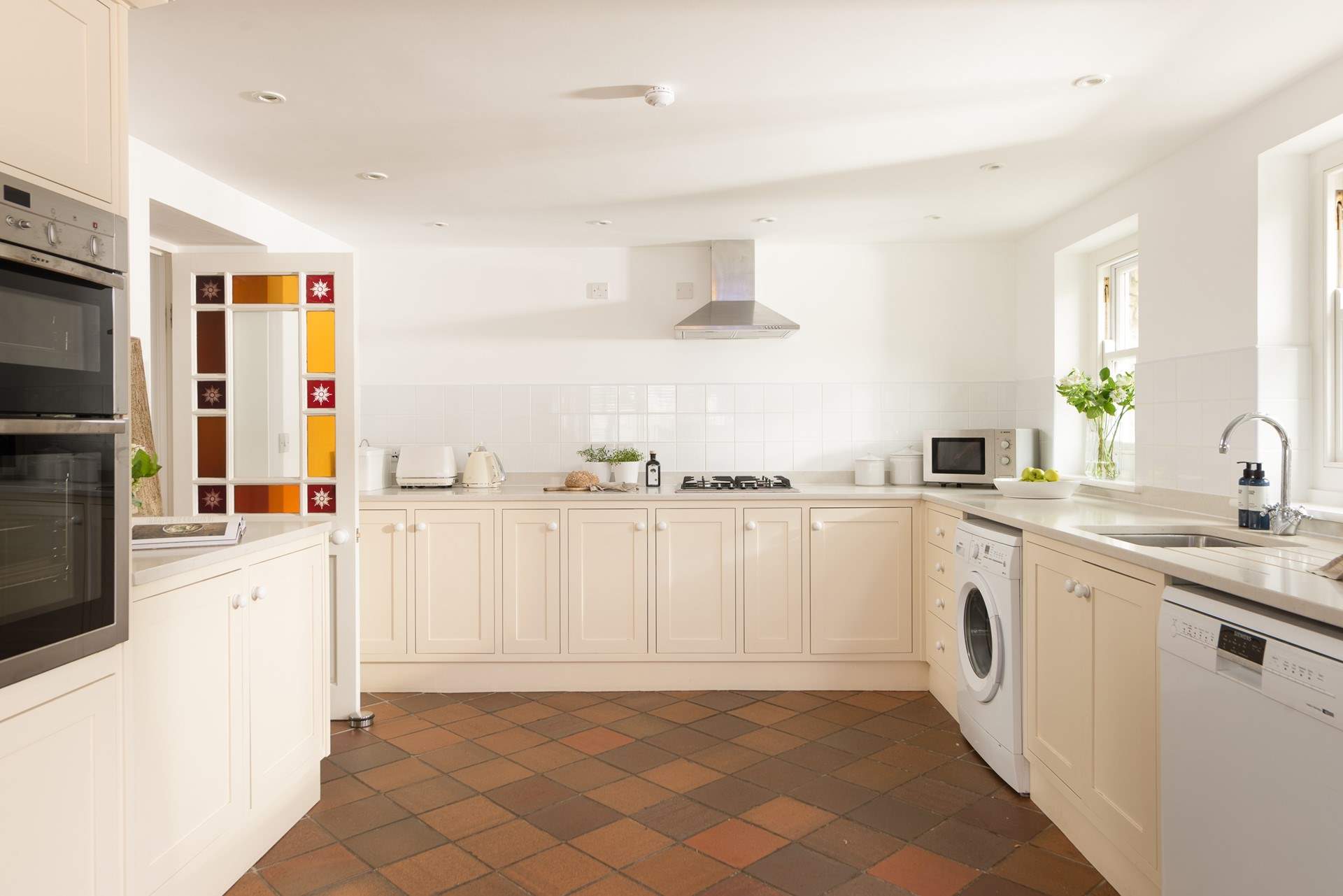 The lovely and light kitchen.