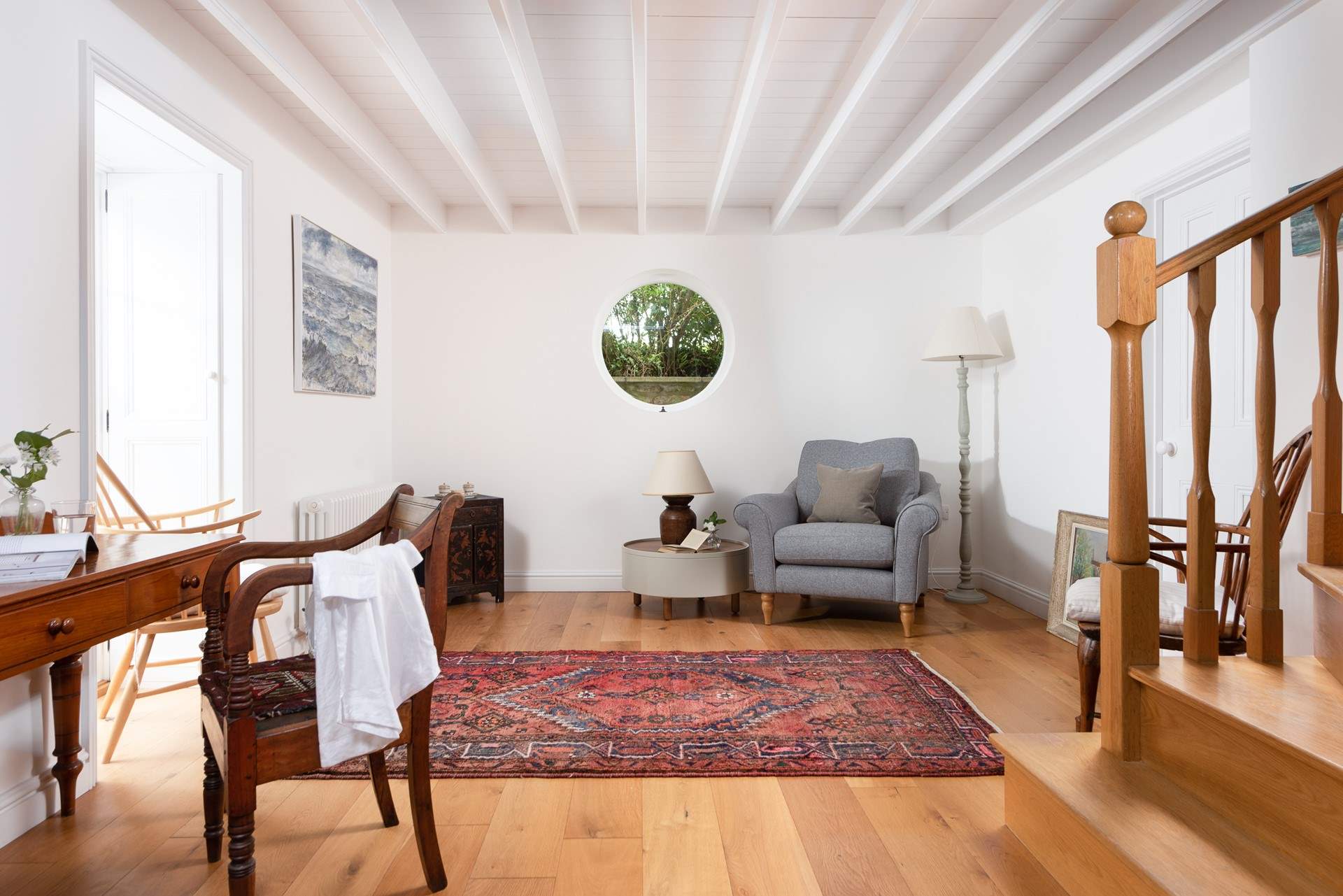 Sit at the desk to do some reading or cosy up in the armchair.