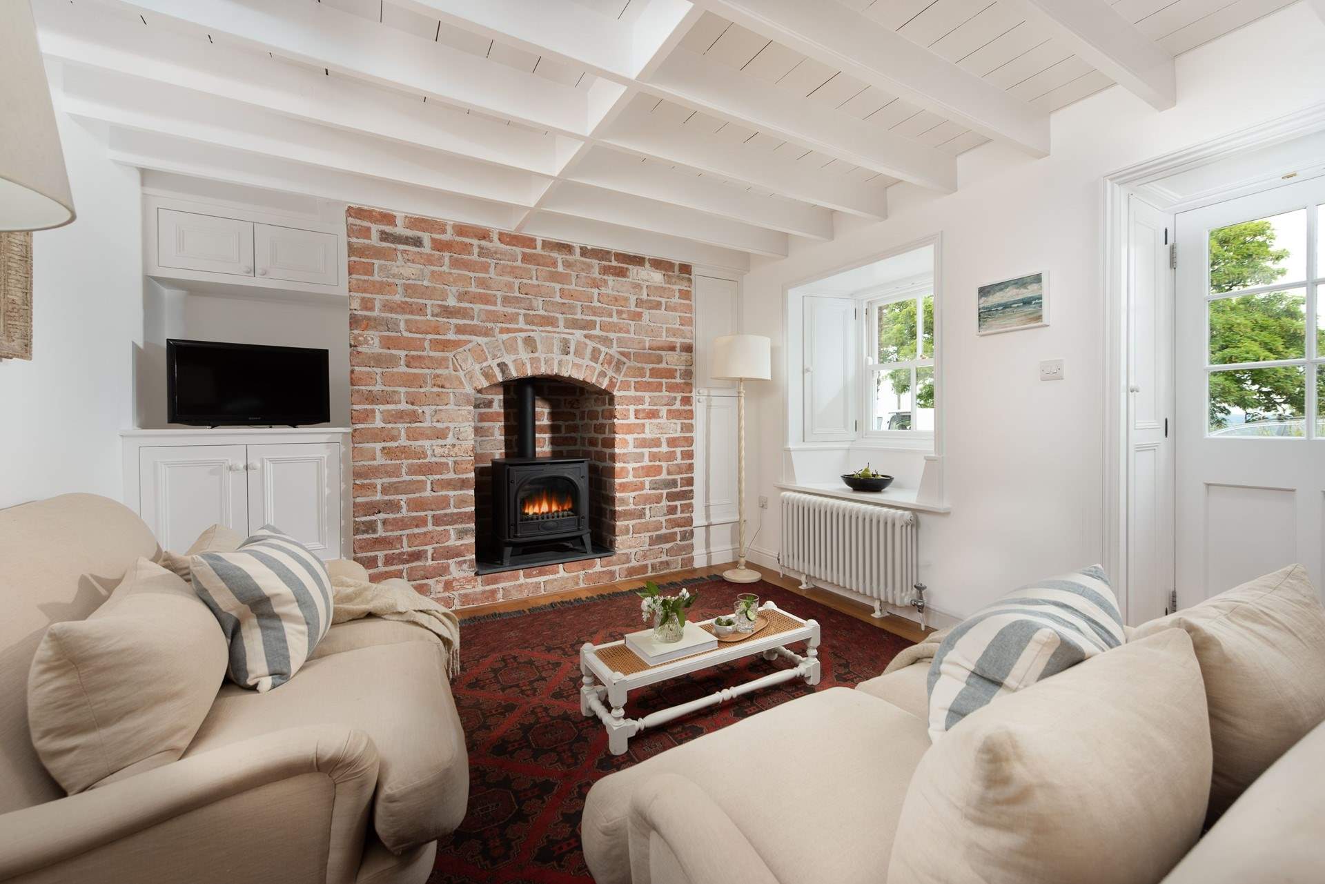 The wood-burner effect gas stove will keep you nice and toasty.