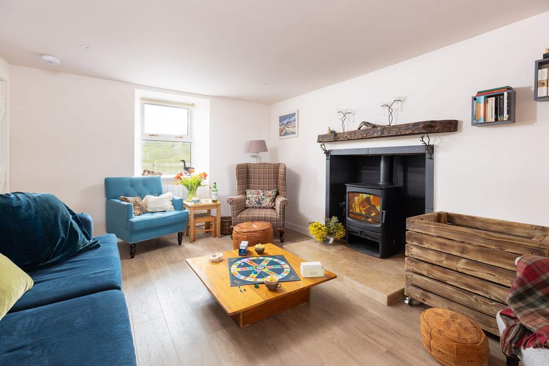 The cosy living-room with wood-burner.