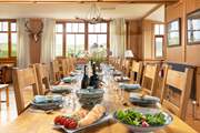 Imagine enjoying a lovely meal at this sumptuous dining-table.