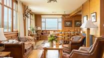 The main sitting-room is warm and cosy,  just made to relax in.