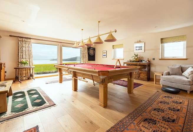 Challenge each other to a game of snooker or darts.