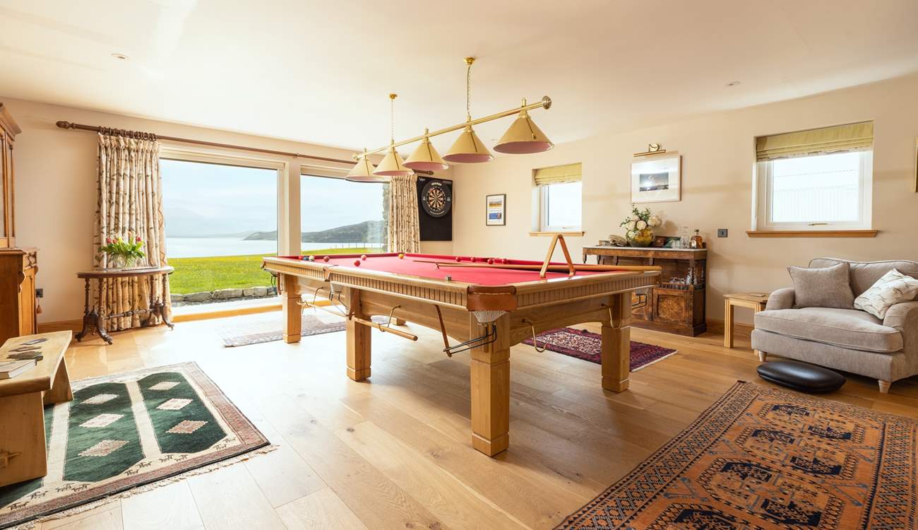 Challenge each other to a game of snooker or darts.