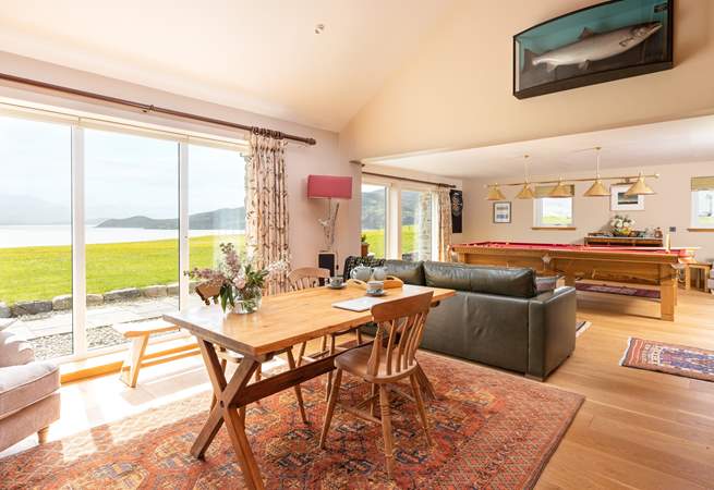 The games-room and library with floor to ceiling windows overlooking the Kyle and Cape Wrath.