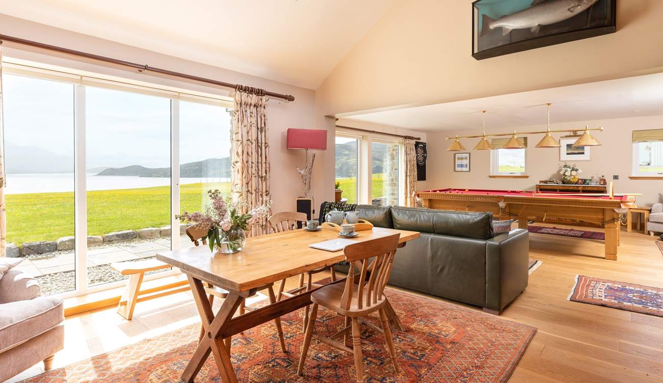 The games-room and library with floor to ceiling windows overlooking the Kyle and Cape Wrath.