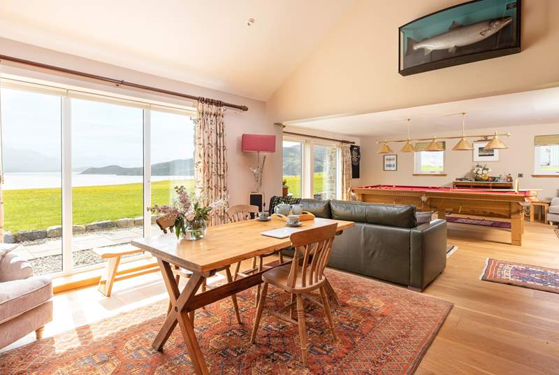 The games-room and library with floor to ceiling windows overlooking the Kyle and Cape Wrath.