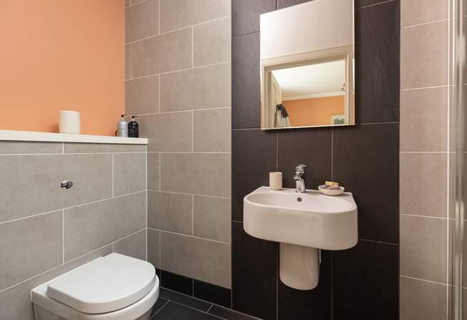 The modern en suite shower-room for bedroom one.