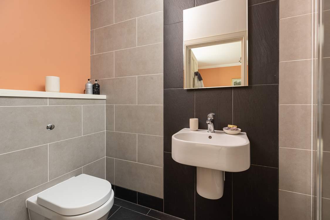 The modern en suite shower-room for bedroom one.