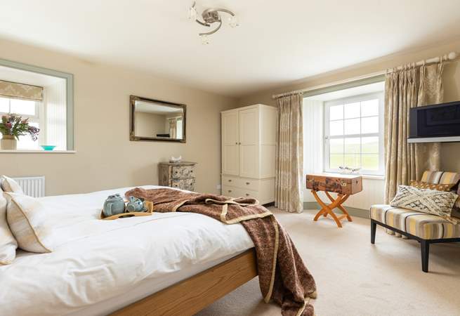 Prepare for a restful night's sleep in beautiful bedroom 5 with its super-king bed.