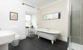 The en suite to bedroom 2 has an indulgent freestanding bath. - Thumbnail Image