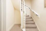 Take the stairs up to bedroom eight.