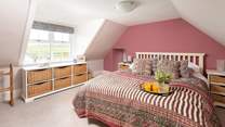 Bedroom 8 completes the family suite with views over the Kyle.