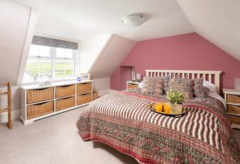 Bedroom 8 completes the family suite with views over the Kyle.