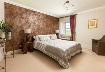 Bedroom 6 is another inviting bedroom with a king-size bed.