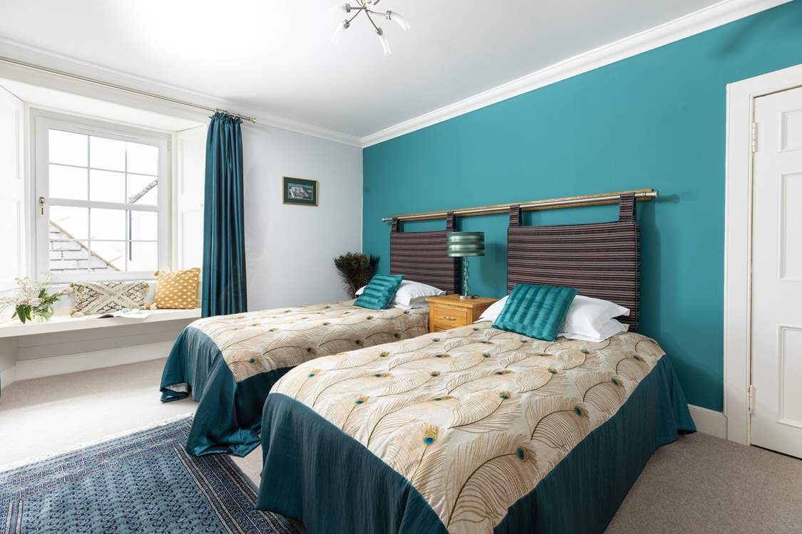 Bedroom 4 has twin beds.