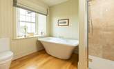 Soak in a bath of bubbles and enjoy a moment of relaxation in the en suite to bedroom 5. - Thumbnail Image