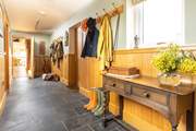 The long rear entrance hall leading to further delights.