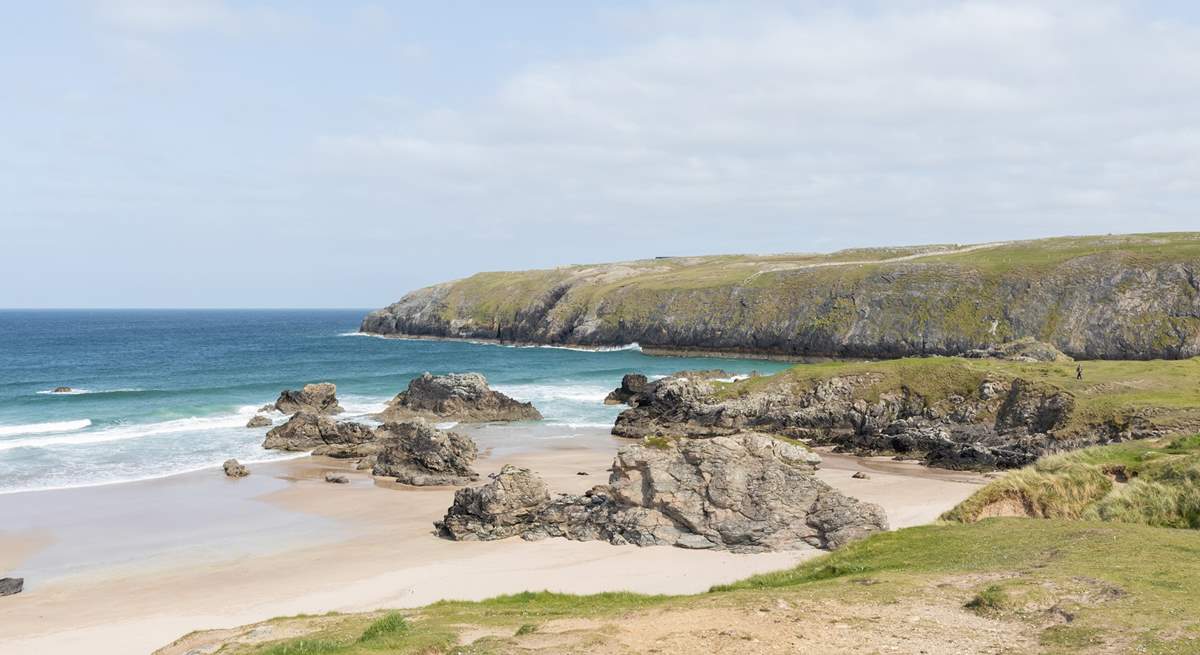 Sango Bay with the turquoise sea crashing over the rocks.